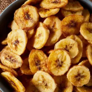 Crispy homemade air fryer banana chips in a bowl