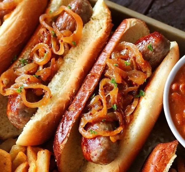 Delicious juicy brats cooked in an air fryer, ready to serve.