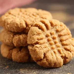 Delicious vegan peanut butter cookies on a baking tray
